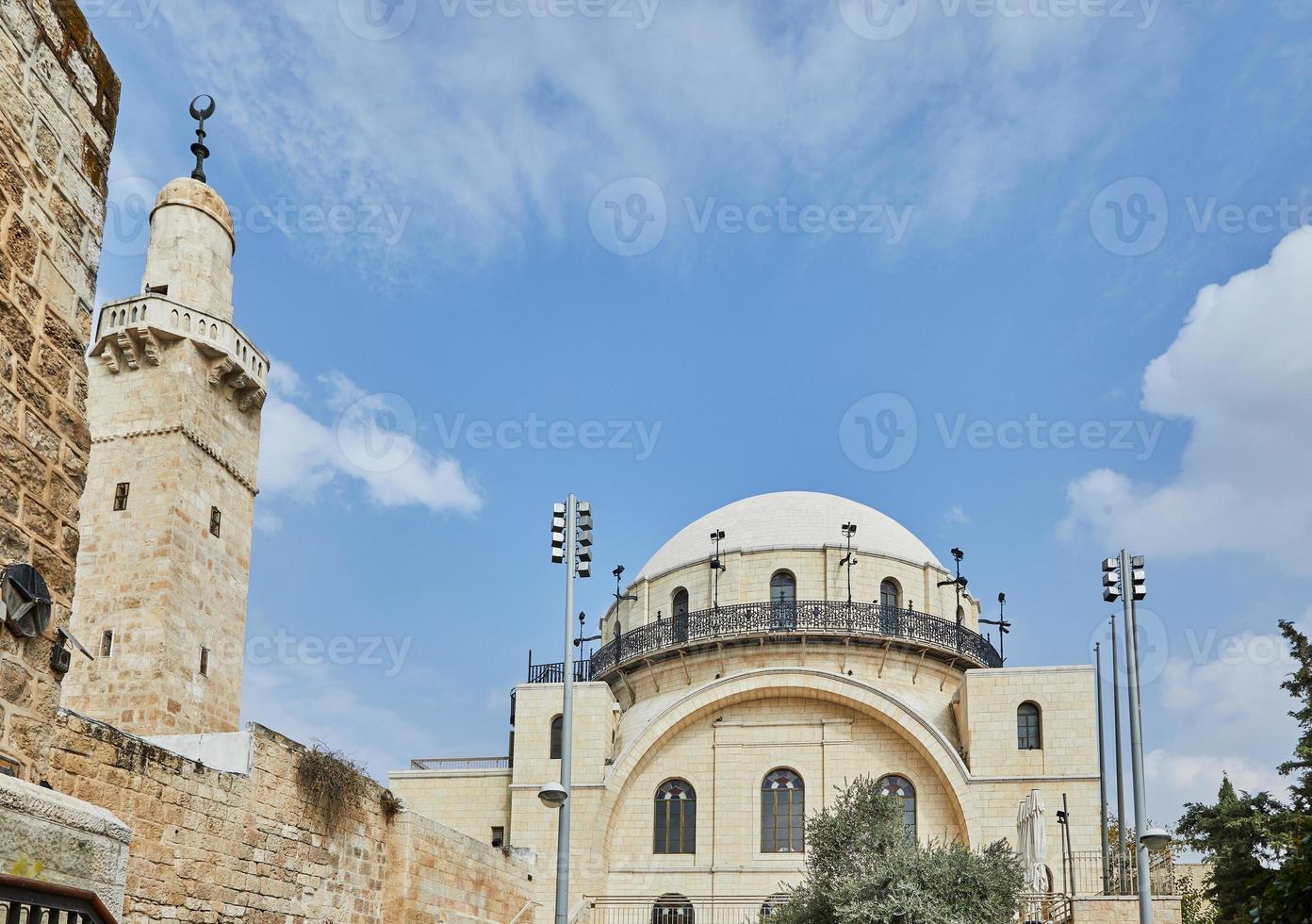 The Ramban synagogue is the oldest functioning synagogue in the Old city. Jerusalem, Israel. Minaret of Sidna Omar Mosque photo