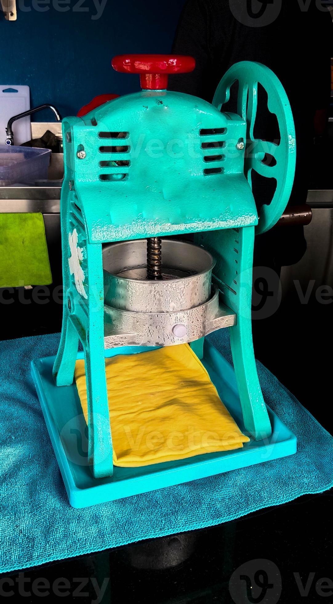 traditional manual ice shaver on shop food 16663186 Stock Photo at Vecteezy