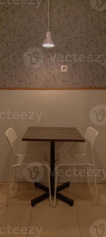 Dining table and chairs for two people, romantic photo