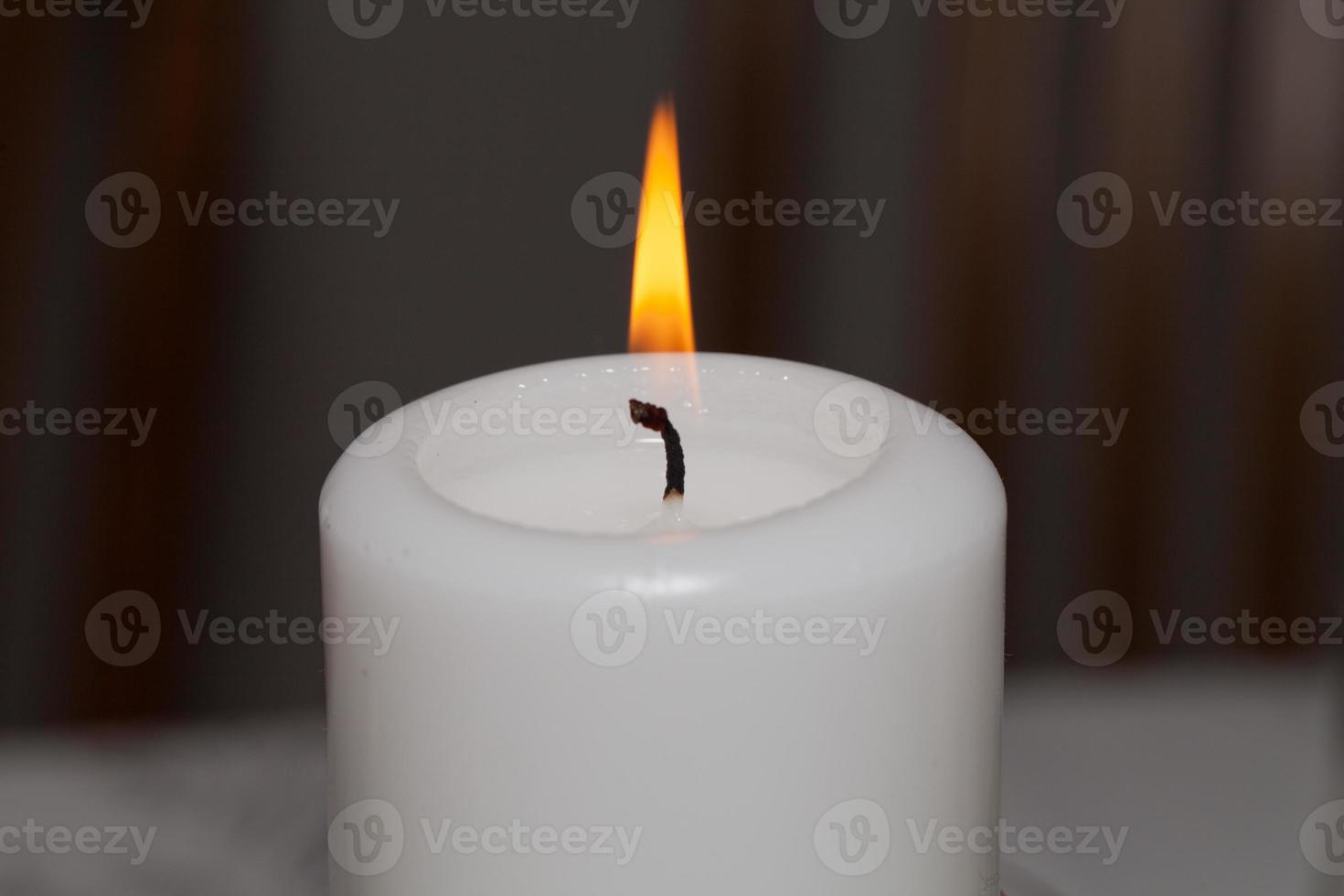 Flame of white candle photo