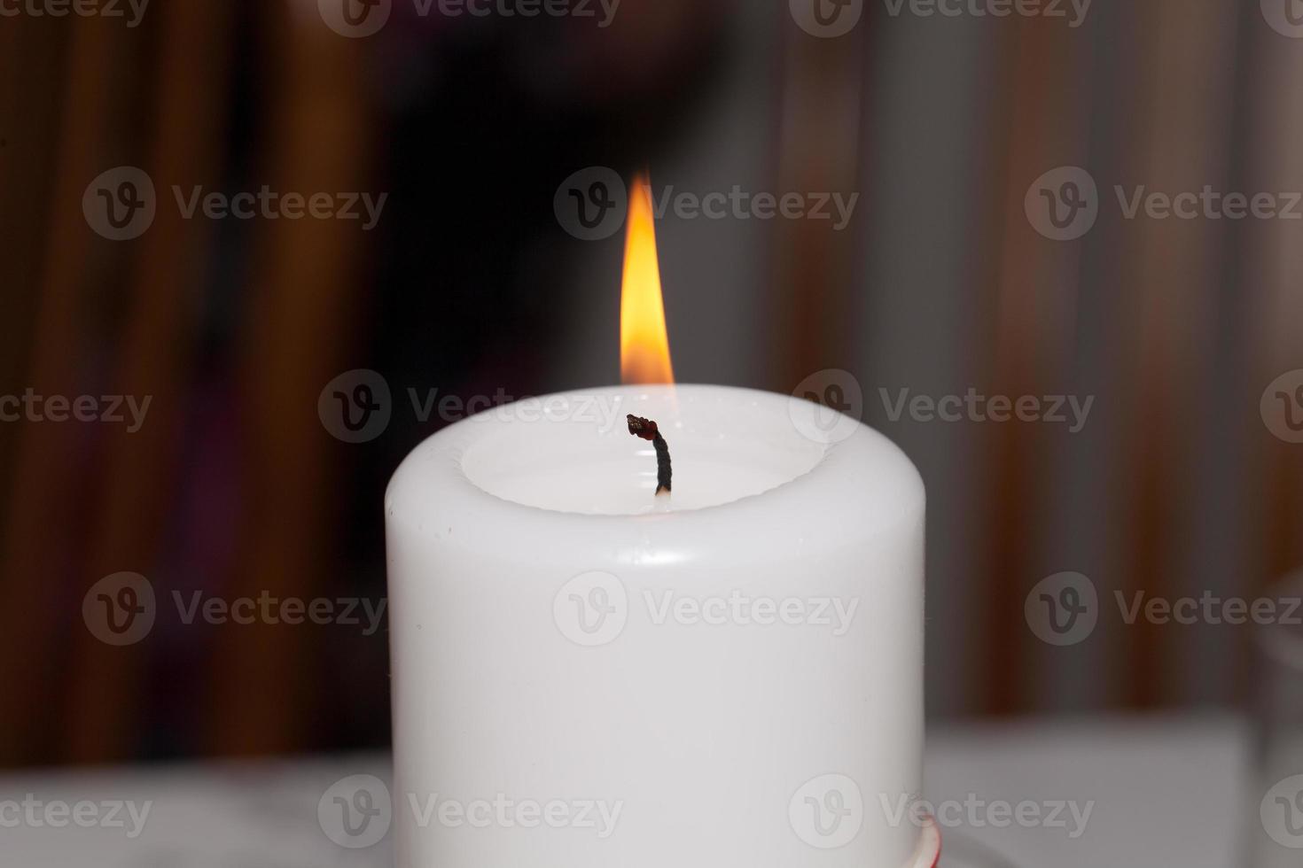 Flame of white candle photo