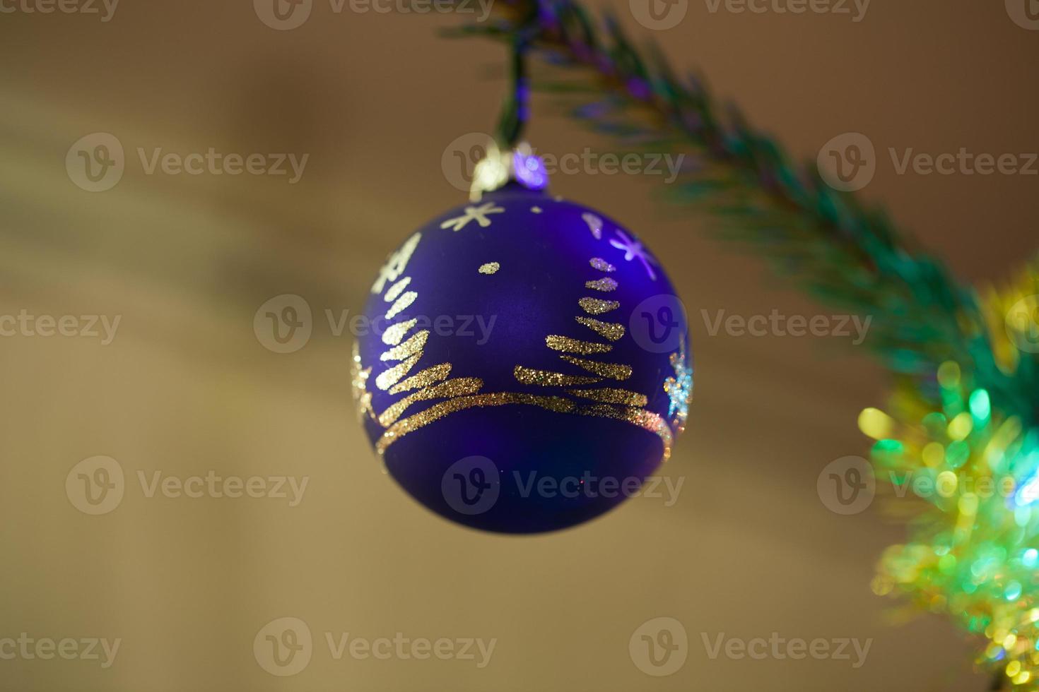 Christmas bauble on christmas tree photo