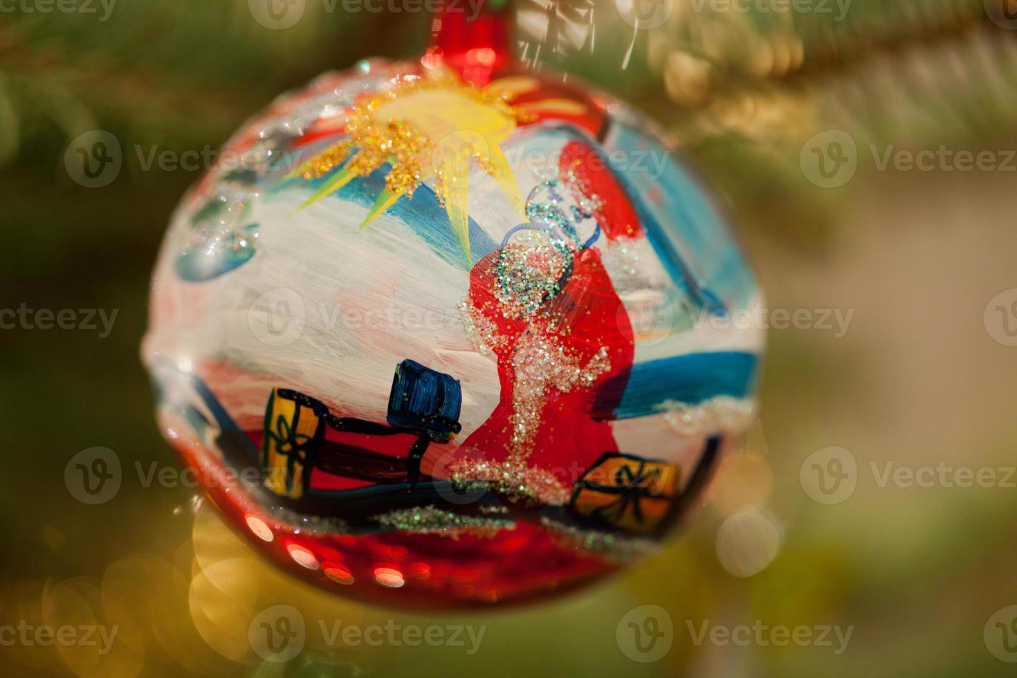 Christmas bauble on christmas tree photo