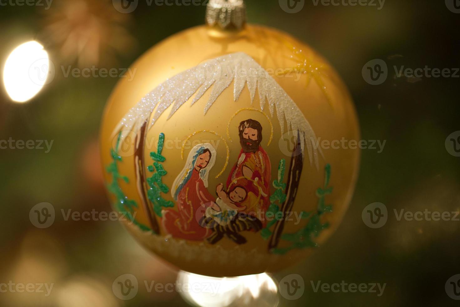 Christmas bauble on christmas tree photo