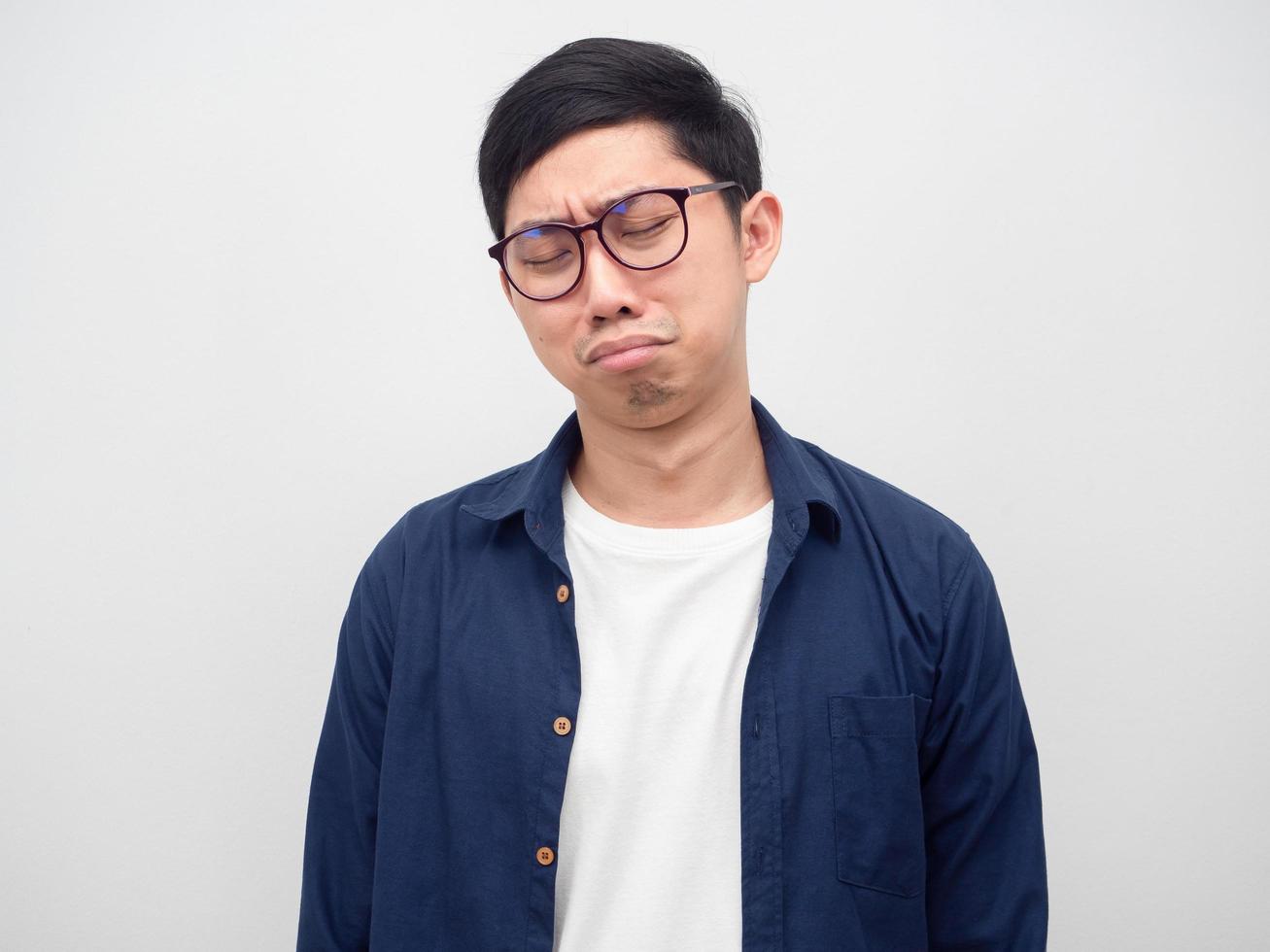 Man wearing glasses cry in sad emotion white background photo