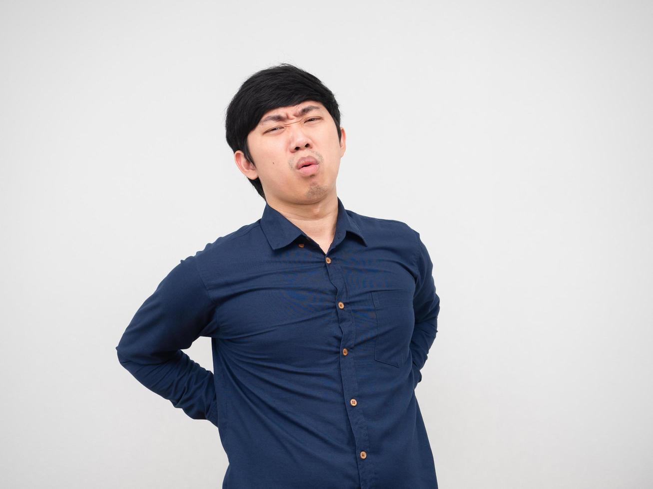 Asian man feeling pain his back unweel face portrait white background photo