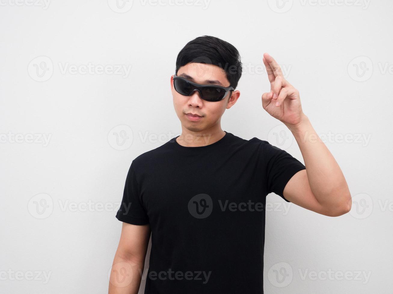 Man wearing sunglasses motion hand white background photo