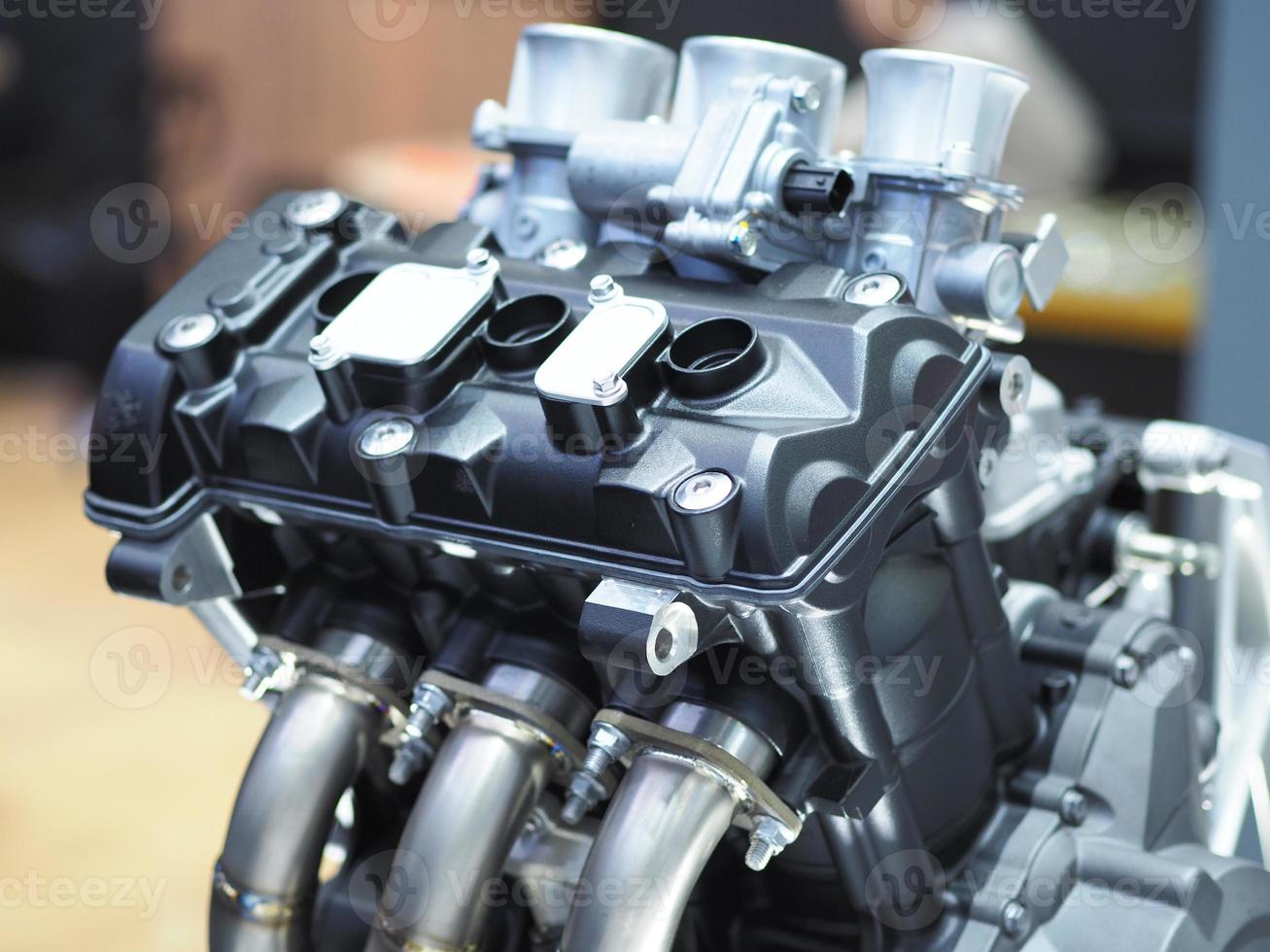 Closeup carburetor machine engine detail new and shiny of car transportation concept,The new engine detail technology photo