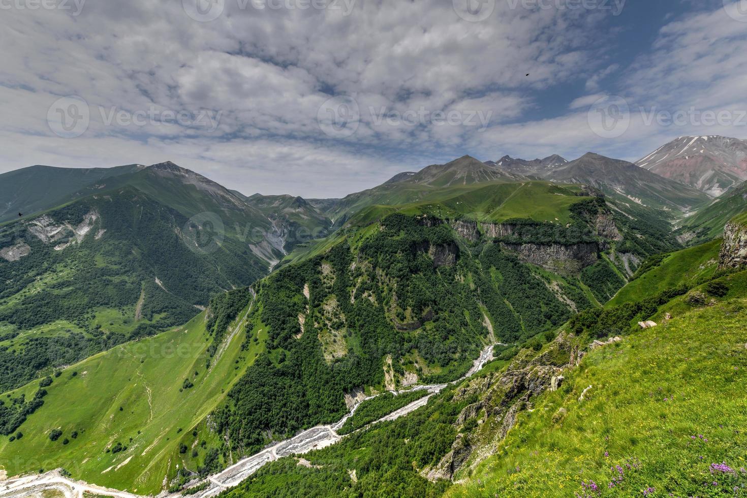 Beautiful colourful mountains viewed from the Russia Georgia Friendship Monument in Kazbegi, Georgia photo