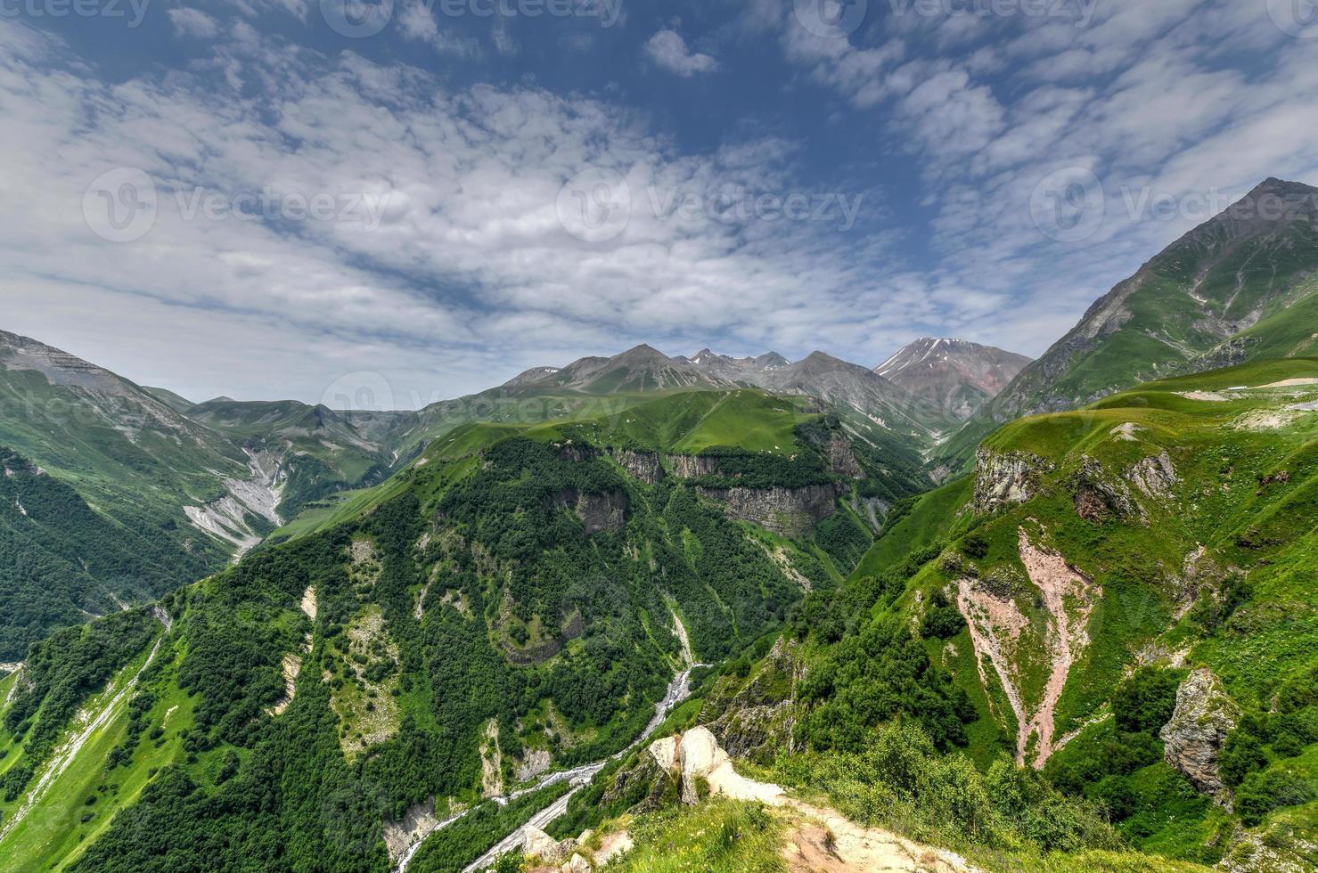 Beautiful colourful mountains viewed from the Russia Georgia Friendship Monument in Kazbegi, Georgia photo