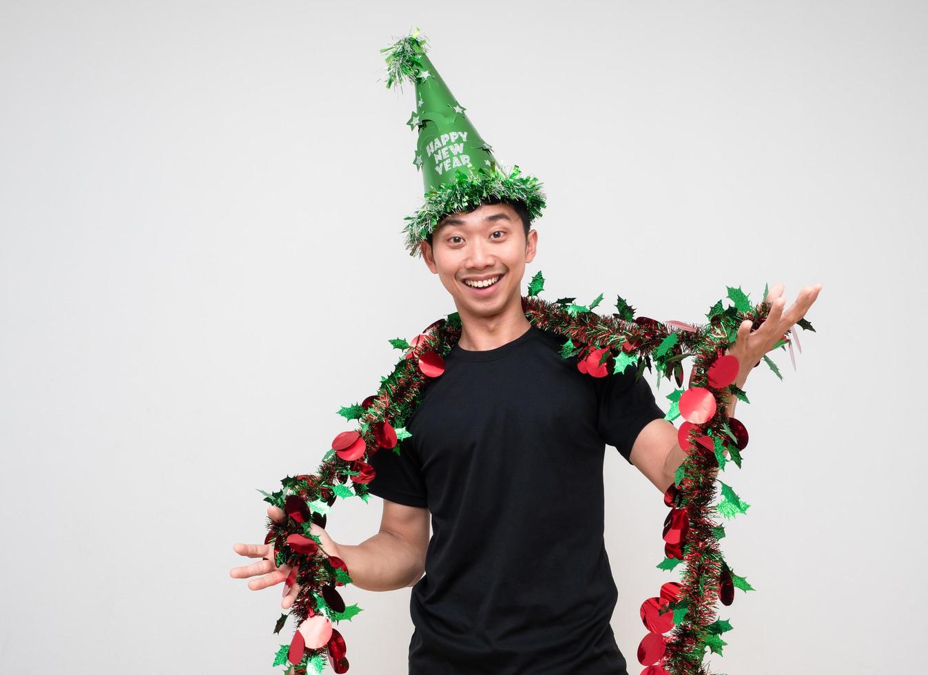 Young man with green hat and tassel colorful happy smile portrait and look at camera on white isolated photo