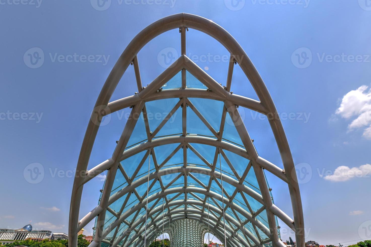The Bridge of Peace in Tbilisi, a pedestrian bridge over the Mtkvari River in Tbilisi, Georgia. photo