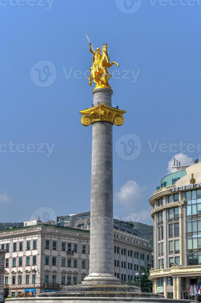 Golden statue of St. George on the main square of Tbilisi, capital city of Georgia. photo