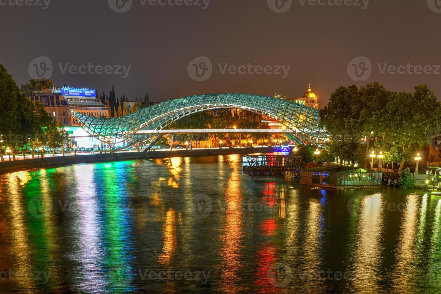 The Bridge of Peace in Tbilisi, a pedestrian bridge over the Mtkvari River in Tbilisi, Georgia. photo