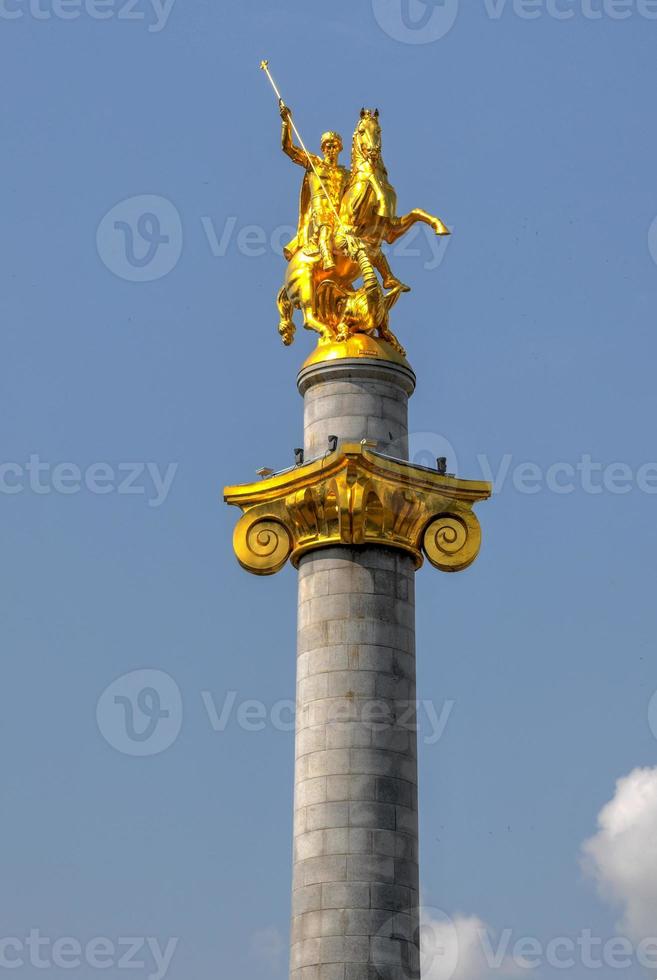 Golden statue of St. George on the main square of Tbilisi, capital city of Georgia. photo