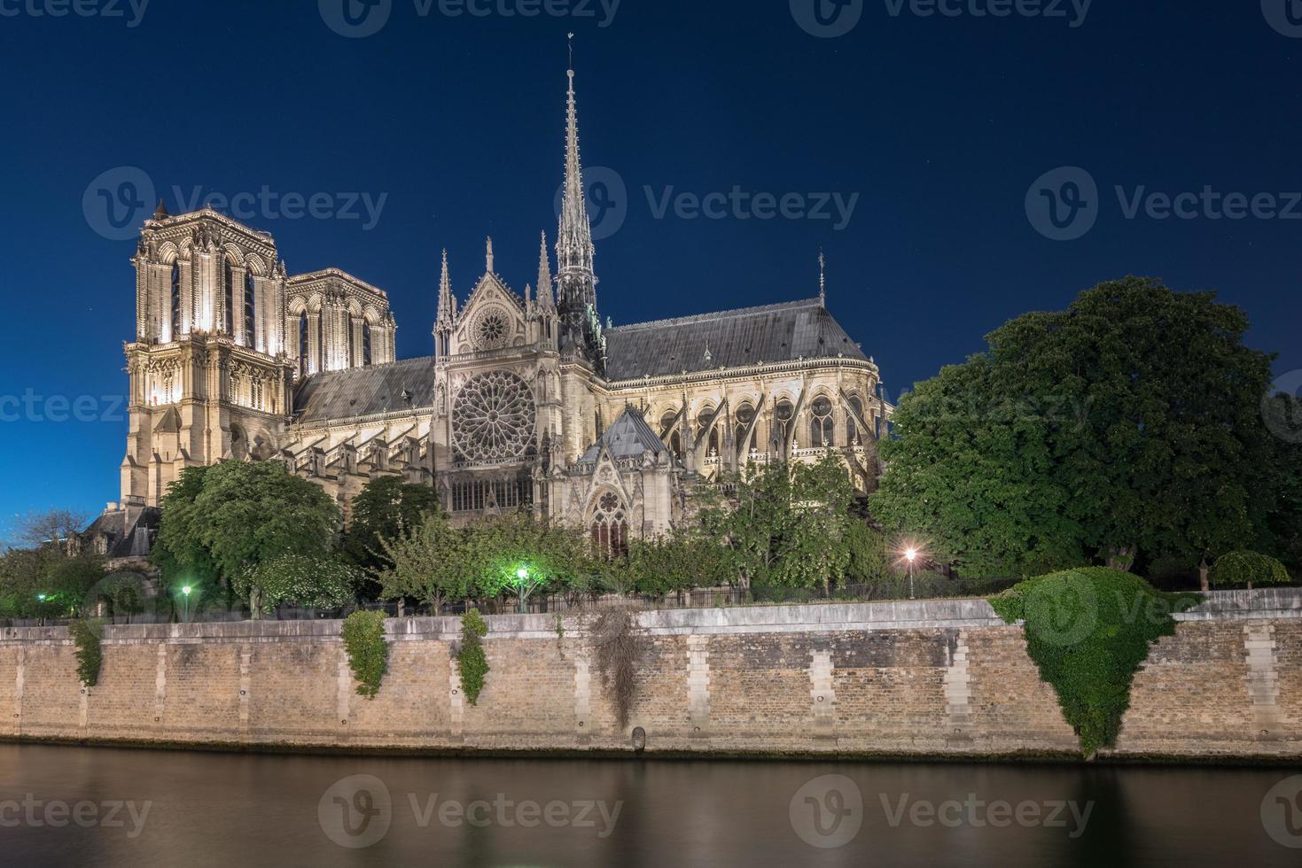Notre-Dame de Paris, is a French Gothic medieval Catholic cathedral on the Ile de la Cite in the fourth arrondissement of Paris, France. photo