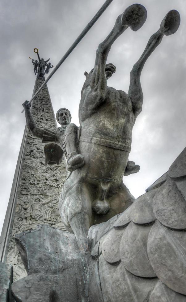 Saint George slaying a dragon by Poklonnaya Hill Obelisk, Moscow, 2022 photo