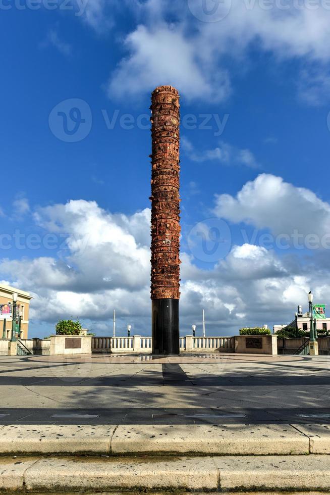 Plaza of the Five Centuries honors the 500-year anniversary of Columbus' first voyage to the Americas. It's dominated by a granite and clay totem pole - El Totem Telurico. photo