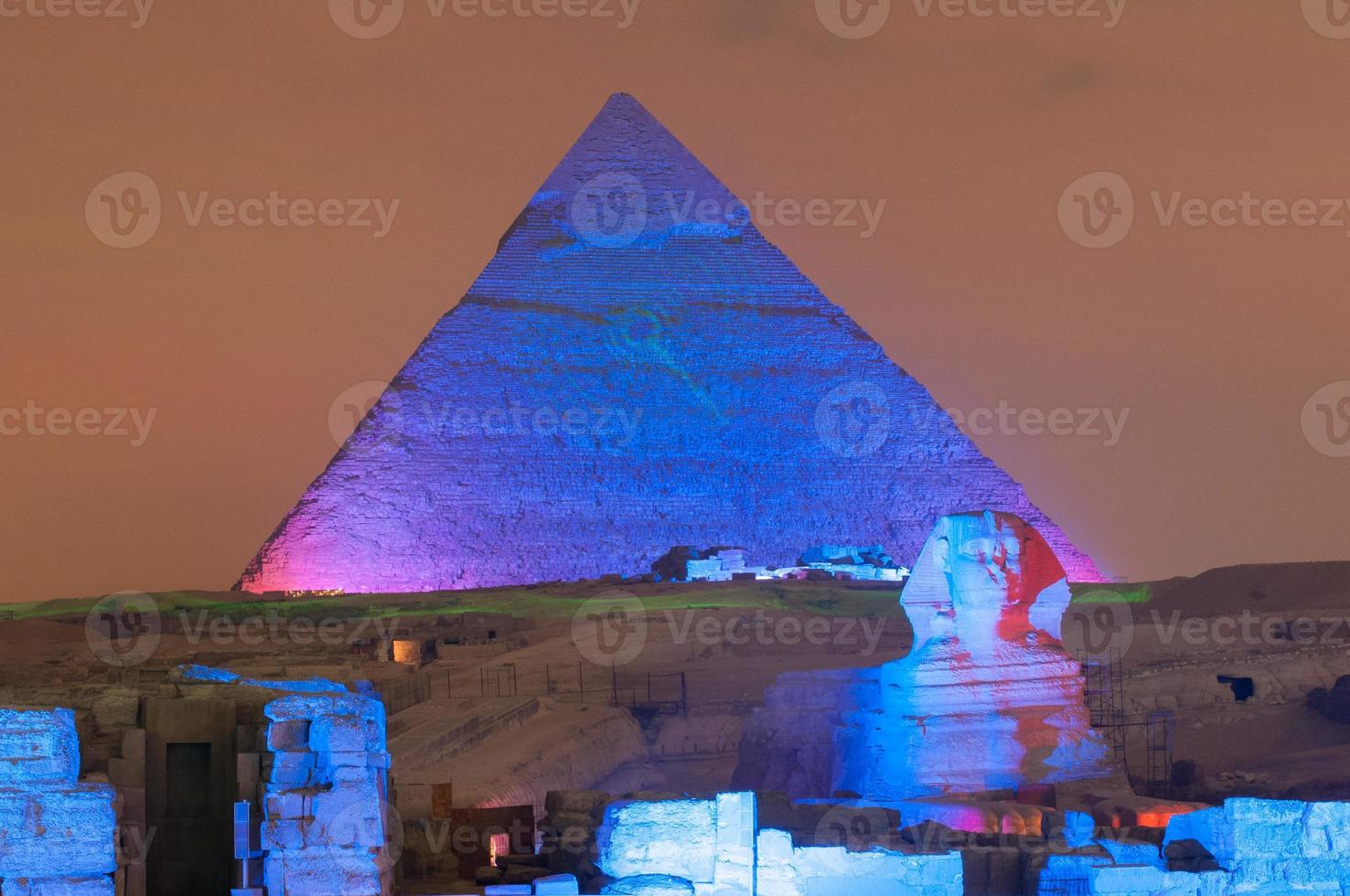 Giza Pyramid and Sphinx Light Show at Night - Cairo, Egypt photo