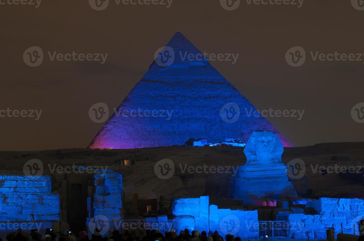 Giza Pyramid and Sphinx Light Show at Night - Cairo, Egypt photo