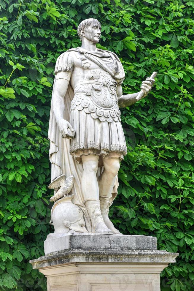 Statue in Tuileries Garden in Paris, France. It is one of the oldest and most popular places in the center of Paris in the 1st district, on the right bank of Seine. photo