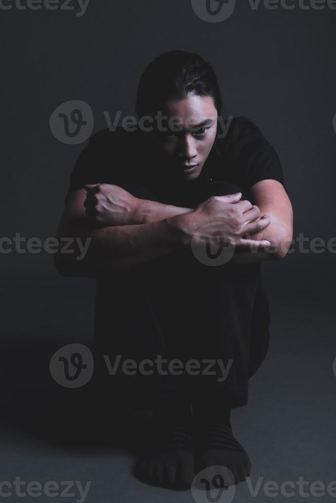 handsome asian fashion looking man posing in studio on black background, lifestyle modern people concept photo