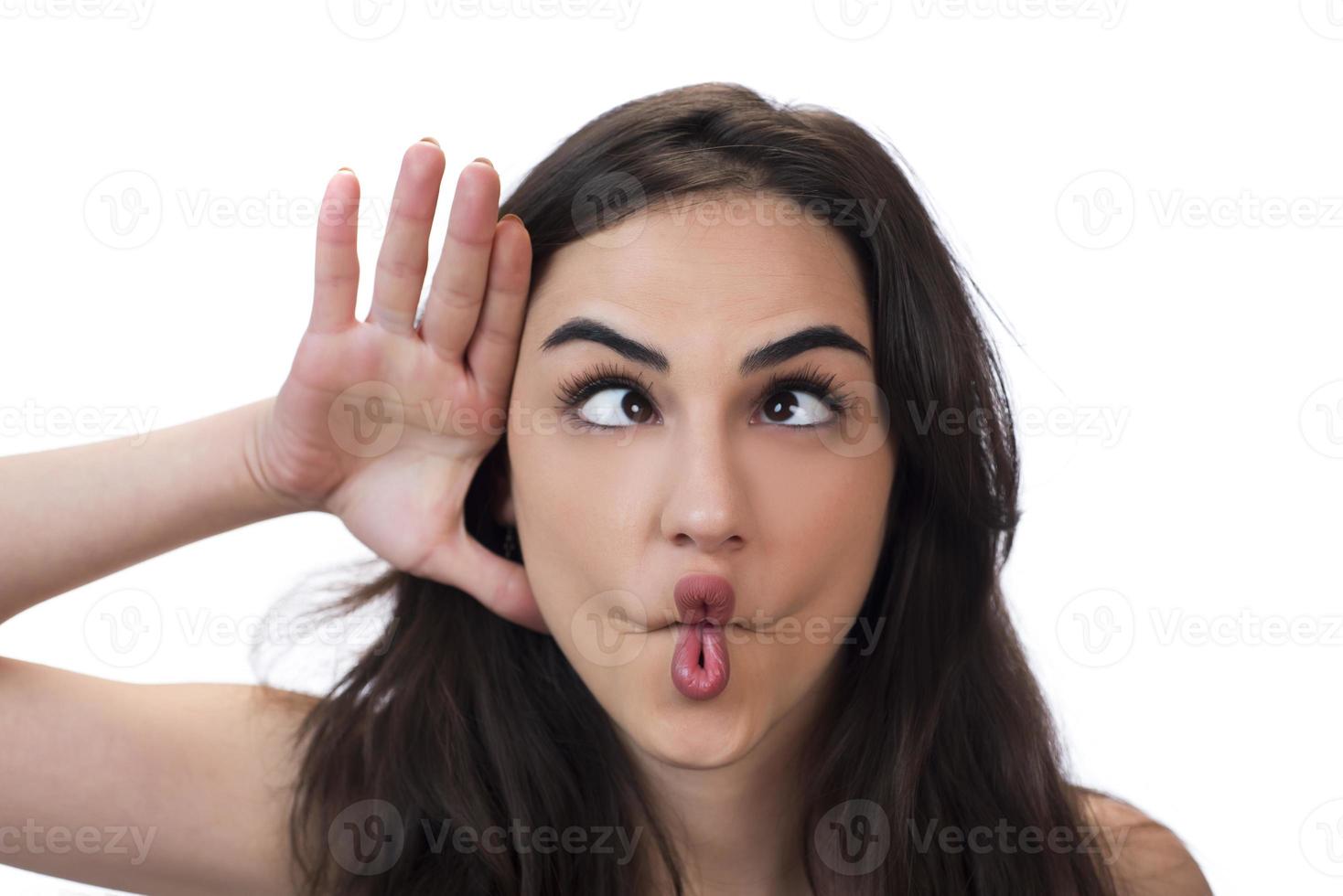squint eyed woman with weird expression isolated on white photo