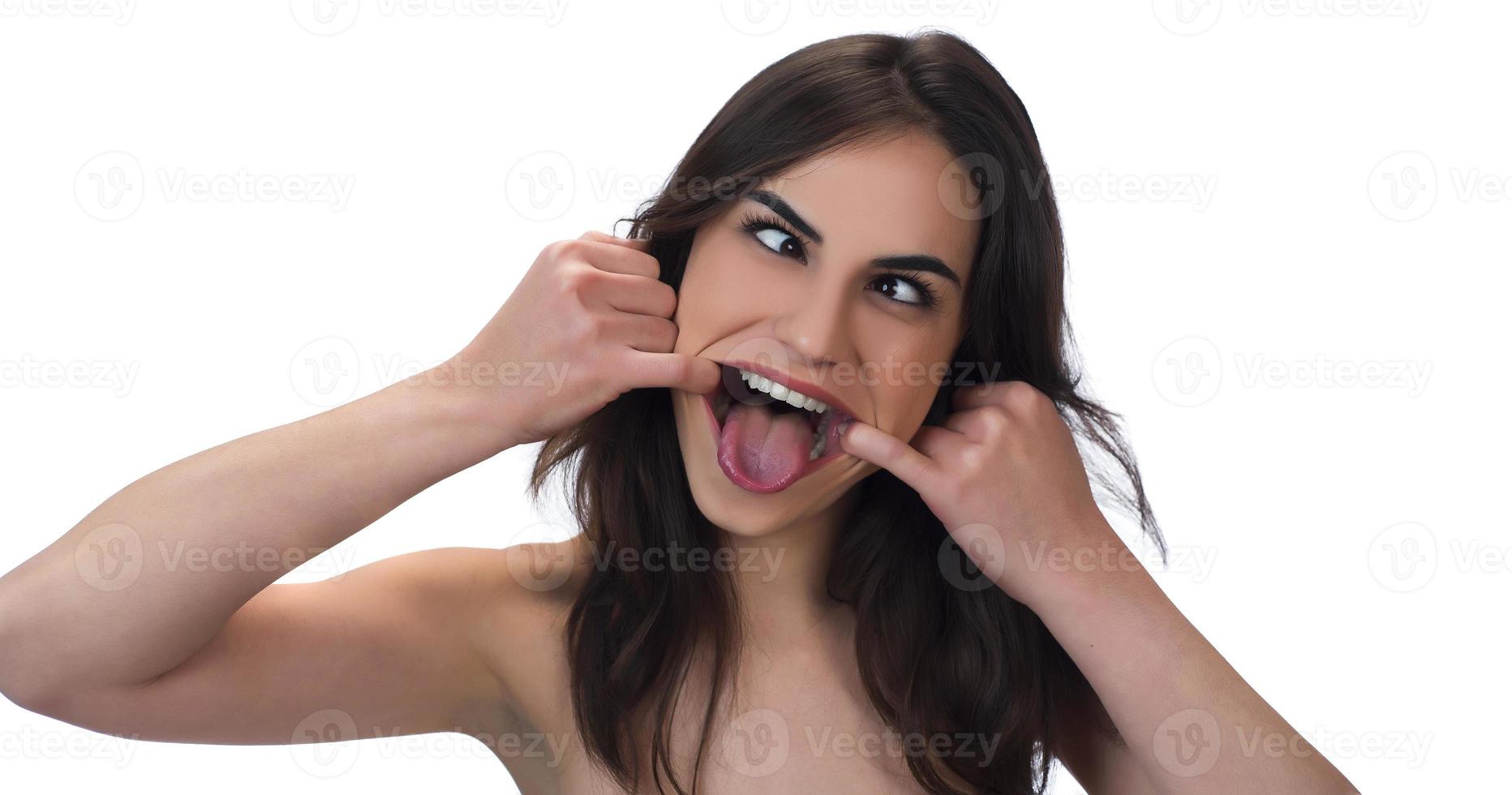 squint eyed woman with weird expression isolated on white photo