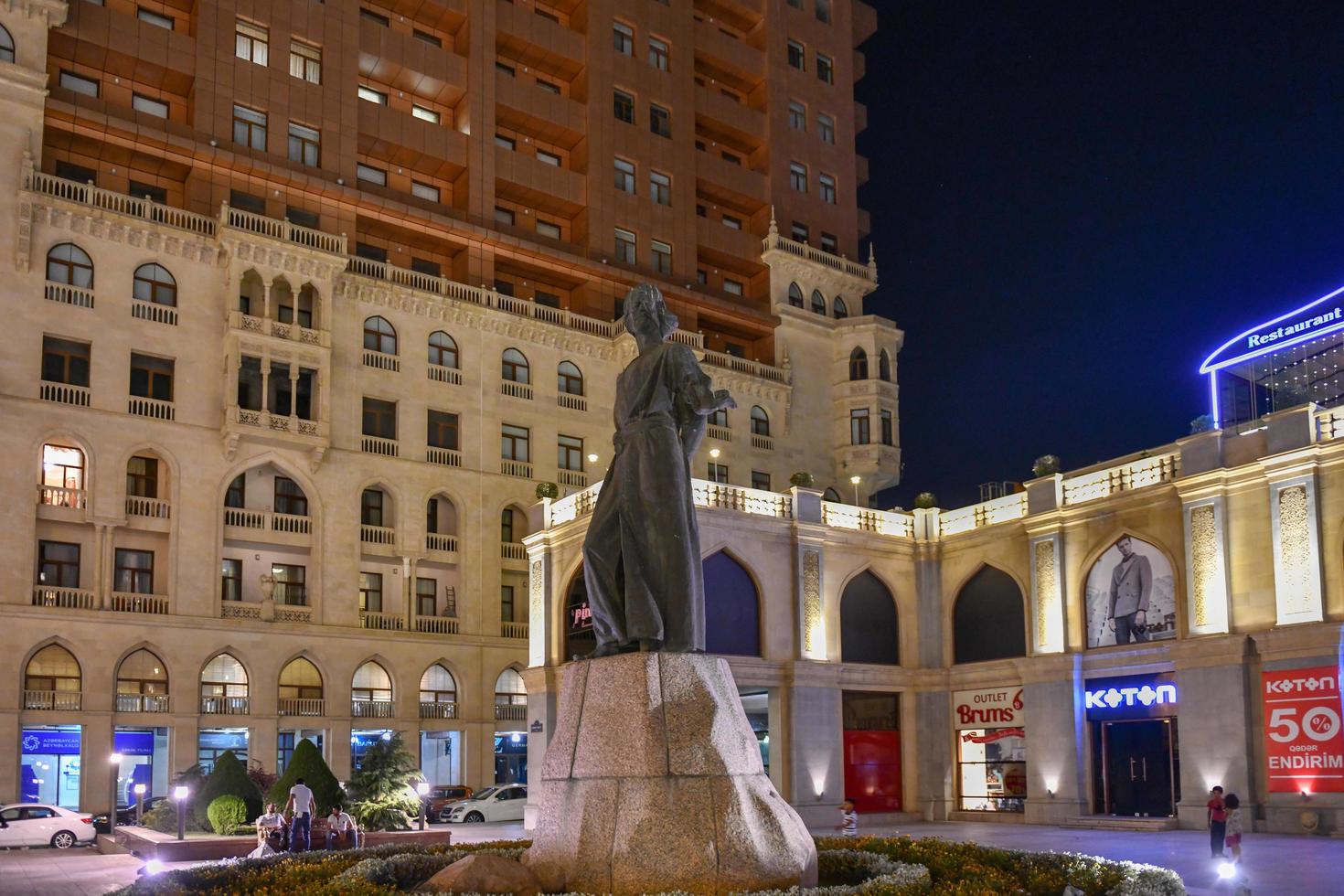 Baku, Azerbaijan - July 14, 2018 -  Monument of national poet of Azerbaijan Imadaddin Nasimi on May 28 at the center of Baku. photo