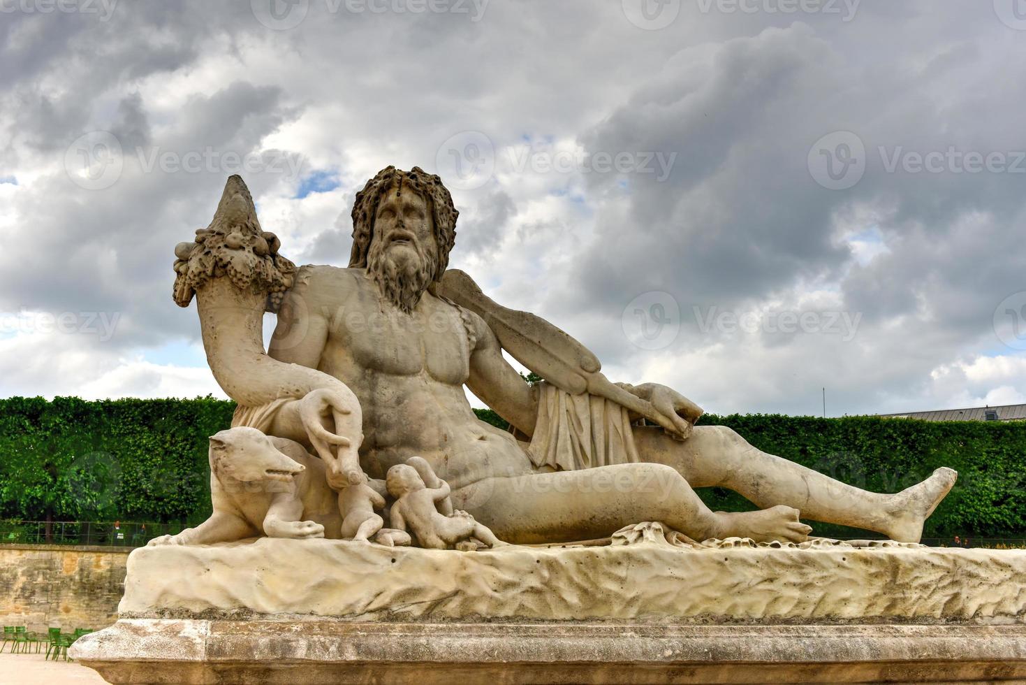 Statue in Tuileries Garden in Paris, France. It is one of the oldest and most popular places in the center of Paris in the 1st district, on the right bank of Seine. photo