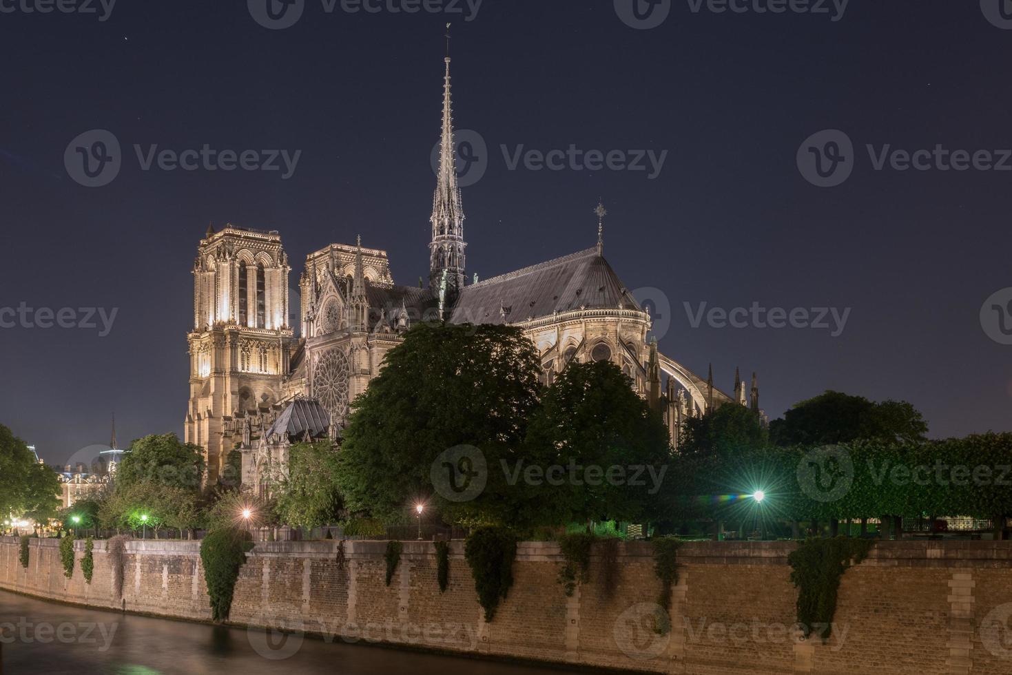 Notre-Dame de Paris, is a French Gothic medieval Catholic cathedral on the Ile de la Cite in the fourth arrondissement of Paris, France. photo