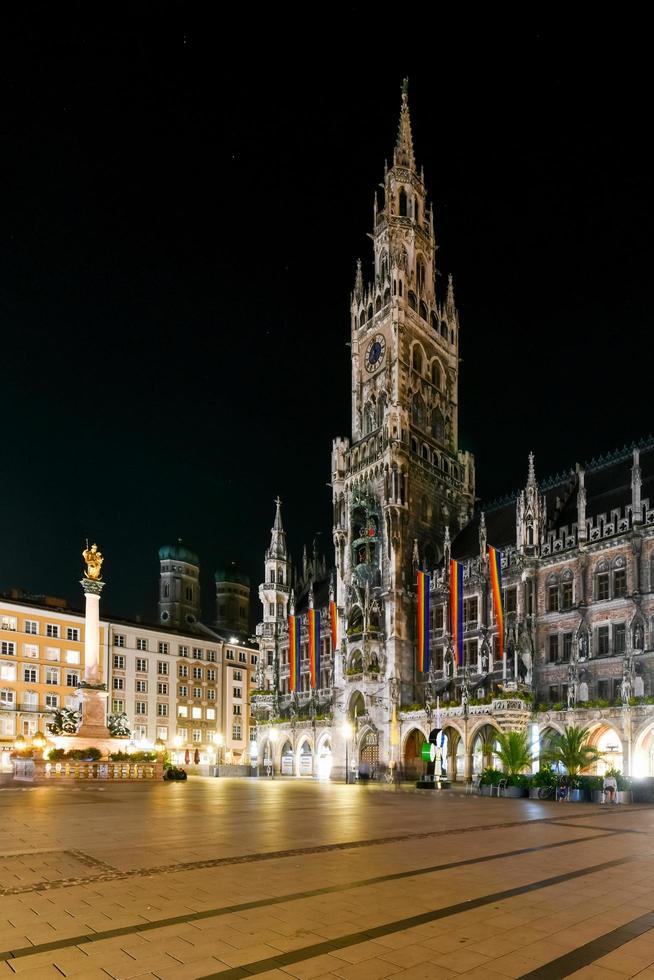 Munich, Germany - July 9, 2021 -  Night panorama of Marienplatz and Munich city hall in Munich, Germany photo