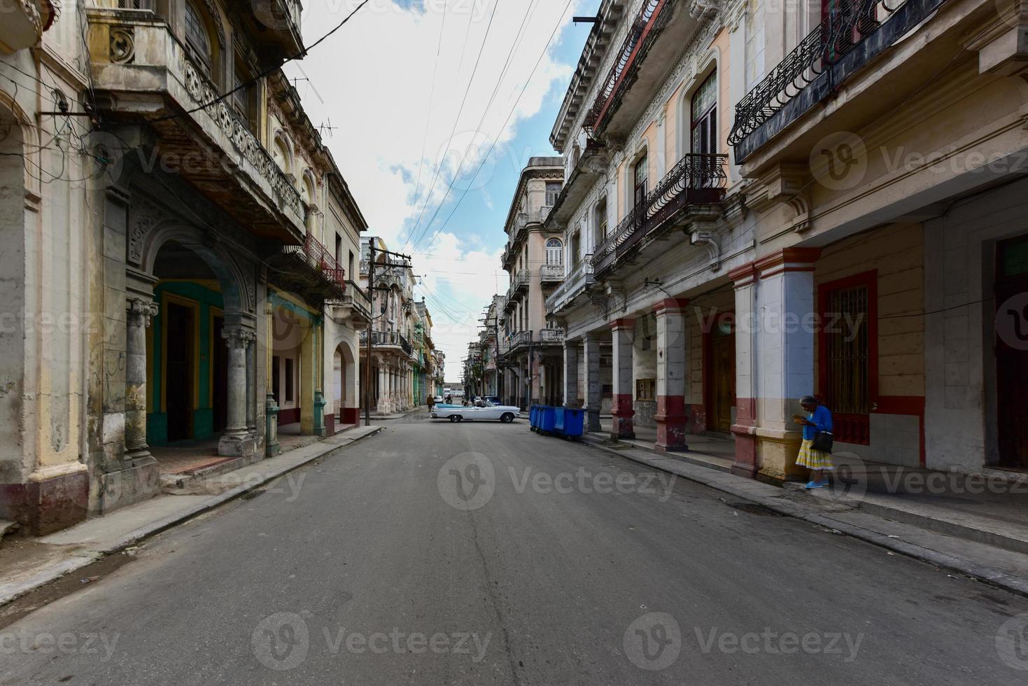 Classic Car driving in the streets of Old Havana, Cuba. photo