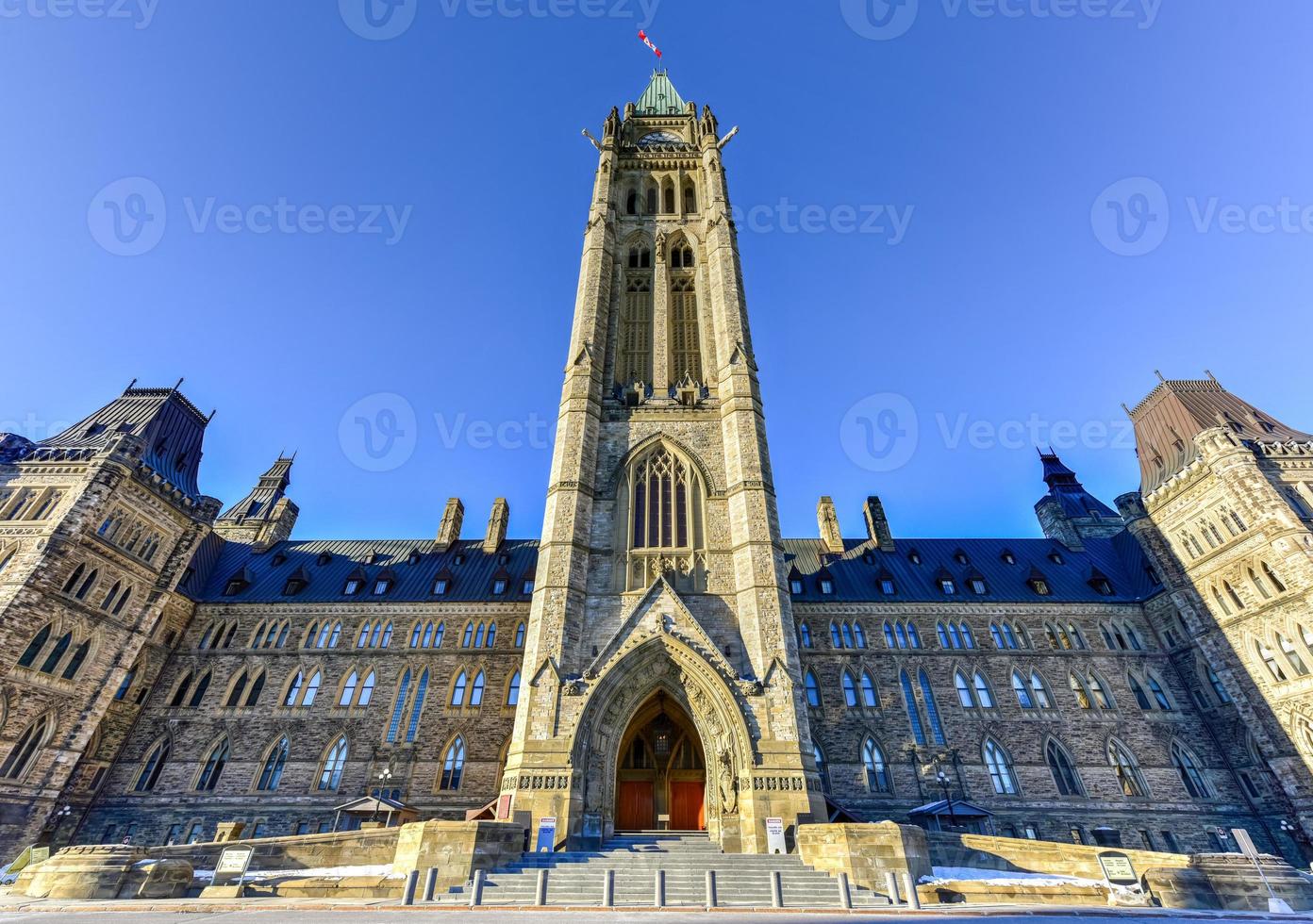 Parliament Hill and the Canadian House of Parliament in Ottawa, Canada during wintertime. photo
