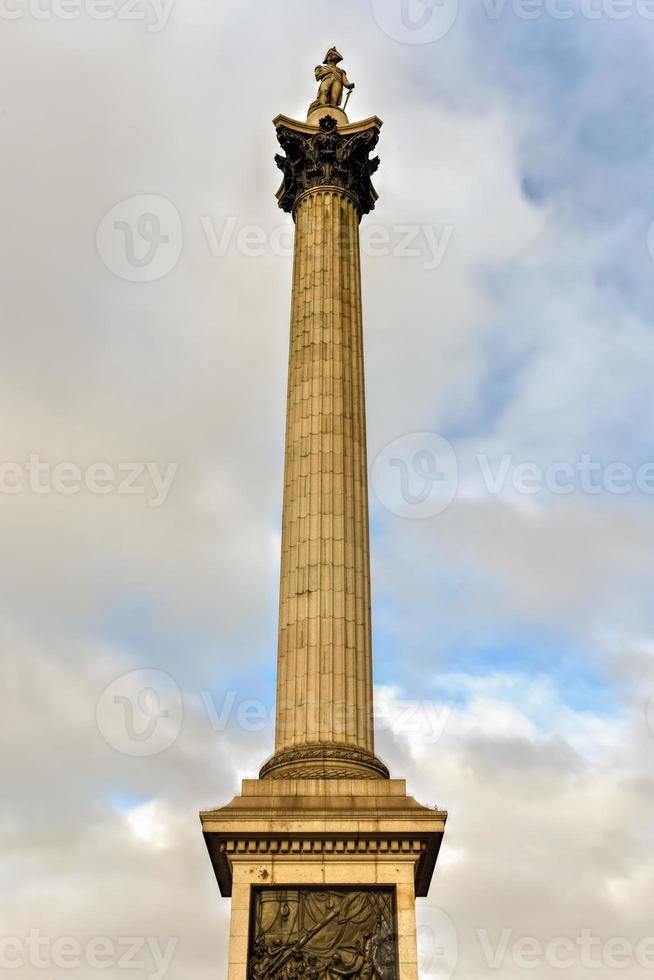 Nelson's Column in Trafalgar Square in London. It is a public square in the City of Westminster, Central London, built around the area formerly known as Charing Cross. photo