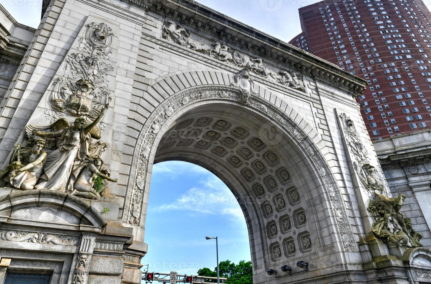 The Greek Revival triumphal arch and colonnade at the Manhattan entrance of the Manhattan Bridge. photo