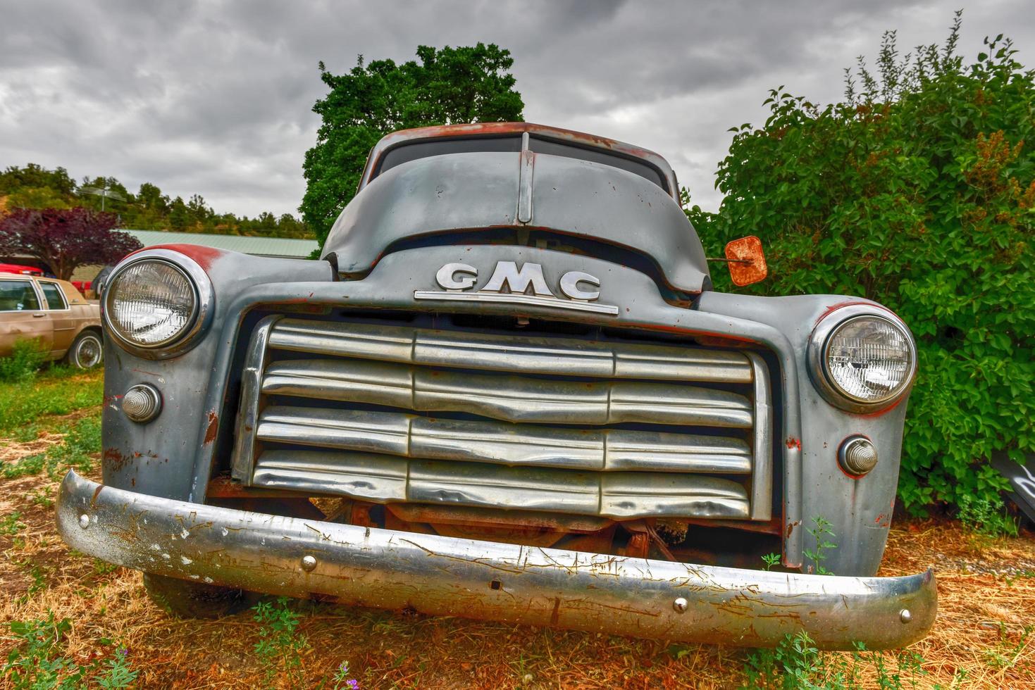 Rusting old car in a desert junk yard in Arizona, USA, 2022 photo