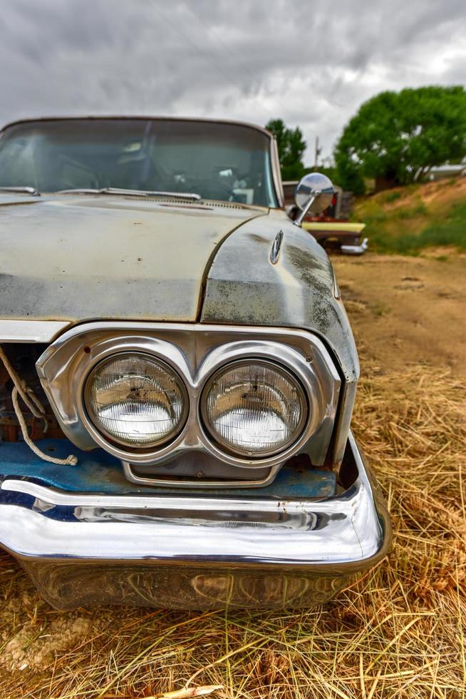 Rusting old car in a desert junk yard in Arizona, USA, 2022 photo