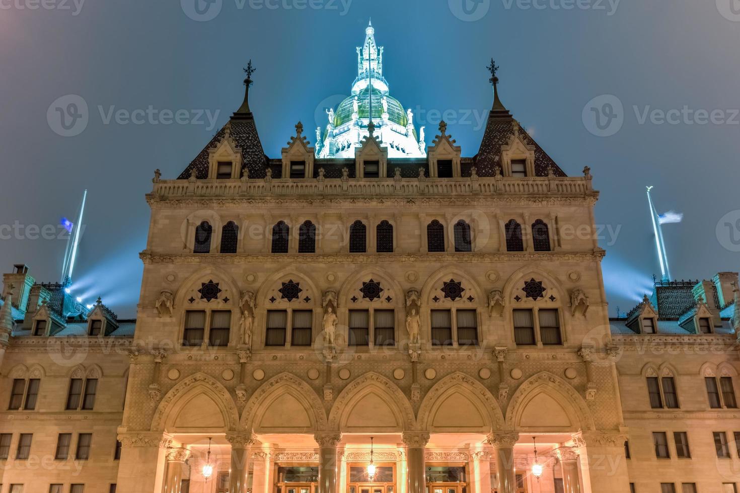 Connecticut State Capitol in Hartford on a winter evening. The building houses the State Senate, the House of Representatives and the office of the Governor. photo