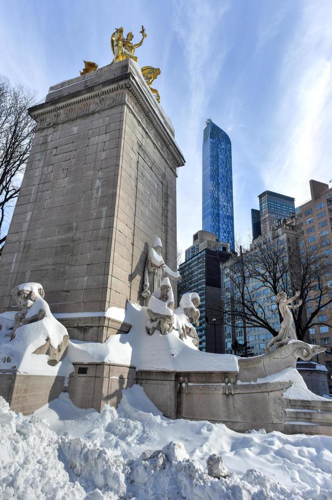 The USS Maine Monument near Columbus Circle outside Central Park in New York City after a snowfall, 2022 photo