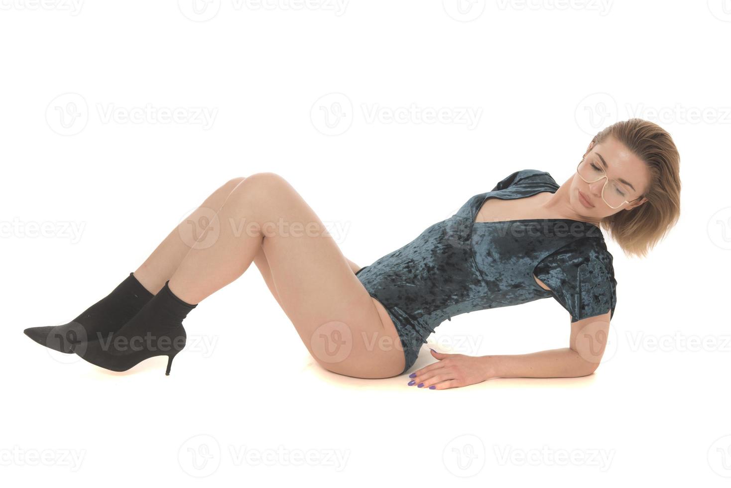 Fashionable young attractive woman posing in studio, wearing black sensual clothes photo