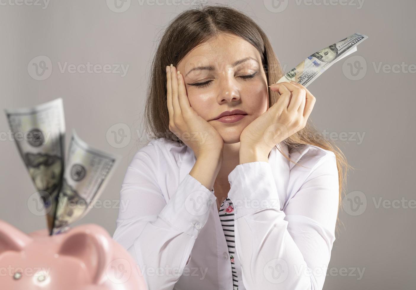 female saving American Dollars photo