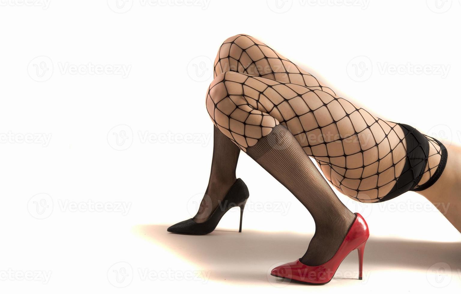 female legs with different type of high heels photo