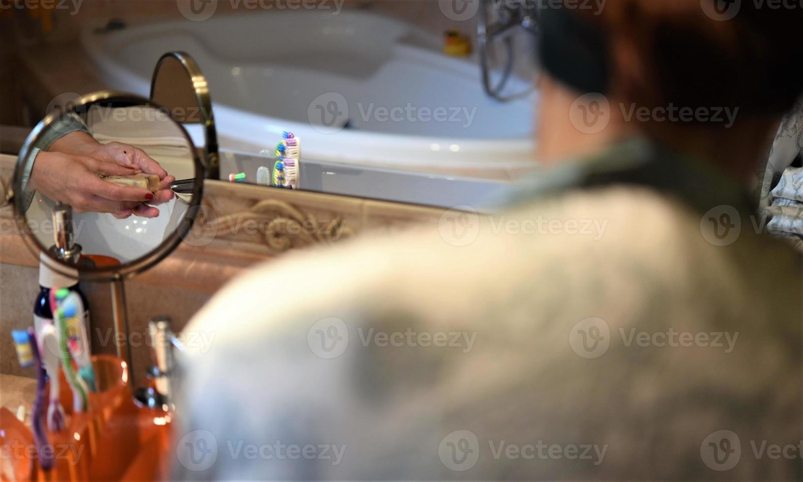 female washing hands photo