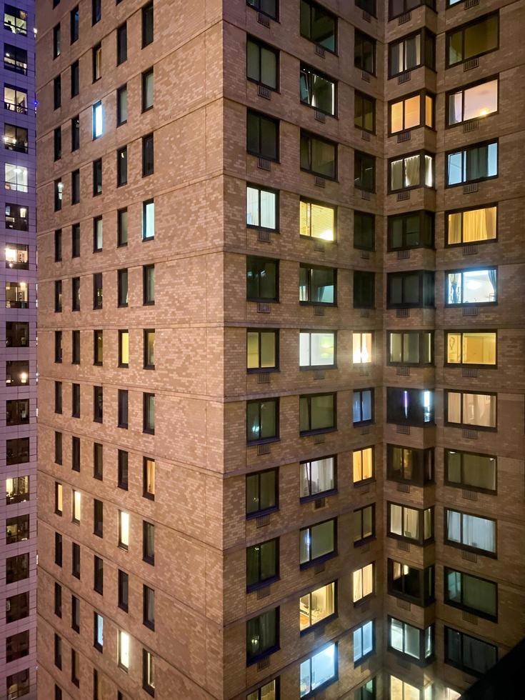 New York cityscape at night up close of towering building, 2022 photo