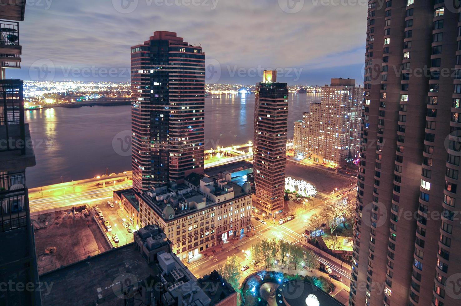 Aerial view along Midtown East in New York City at night. photo