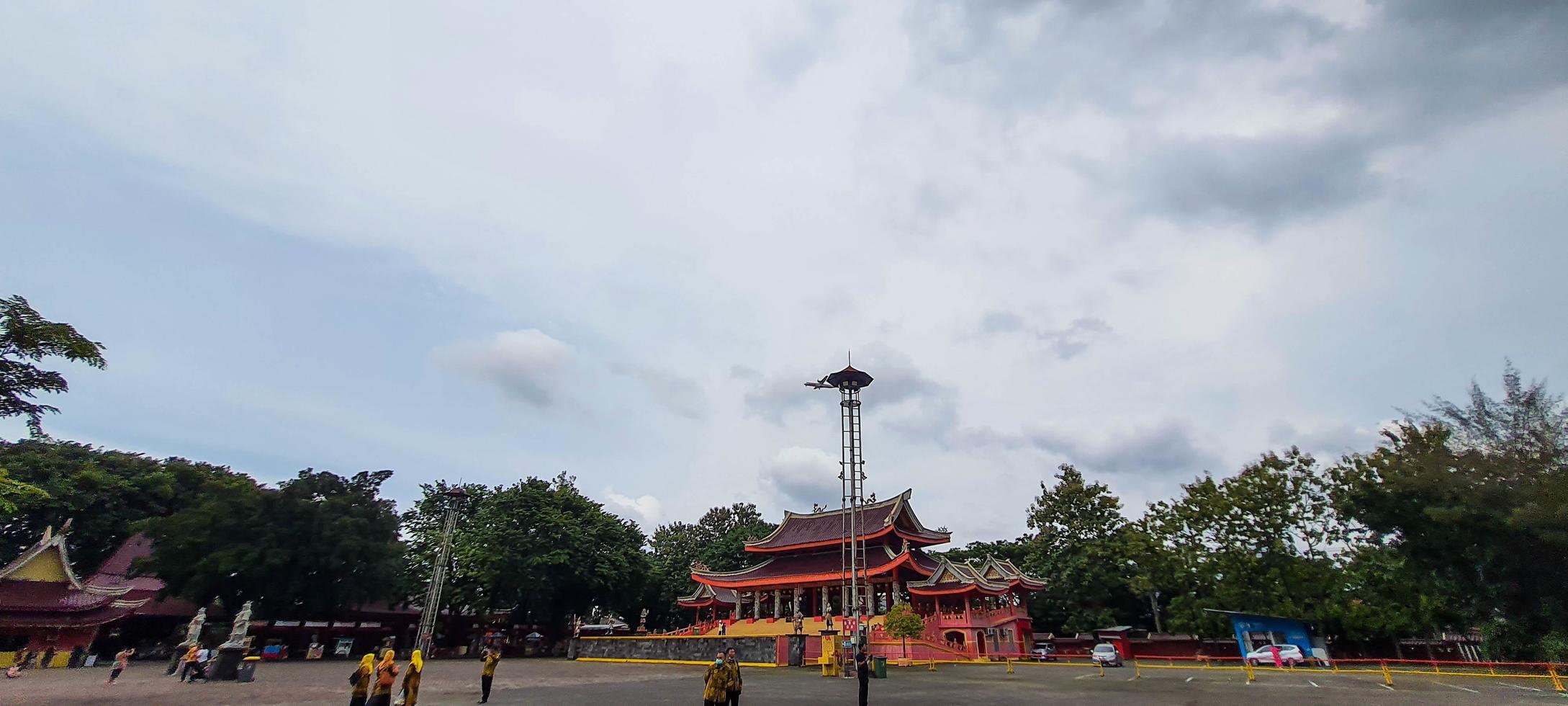 Semarang, Indonesia on July 2022. The atmosphere of the tourists who are in the Sam Poo Kong Temple Area Semarang. photo