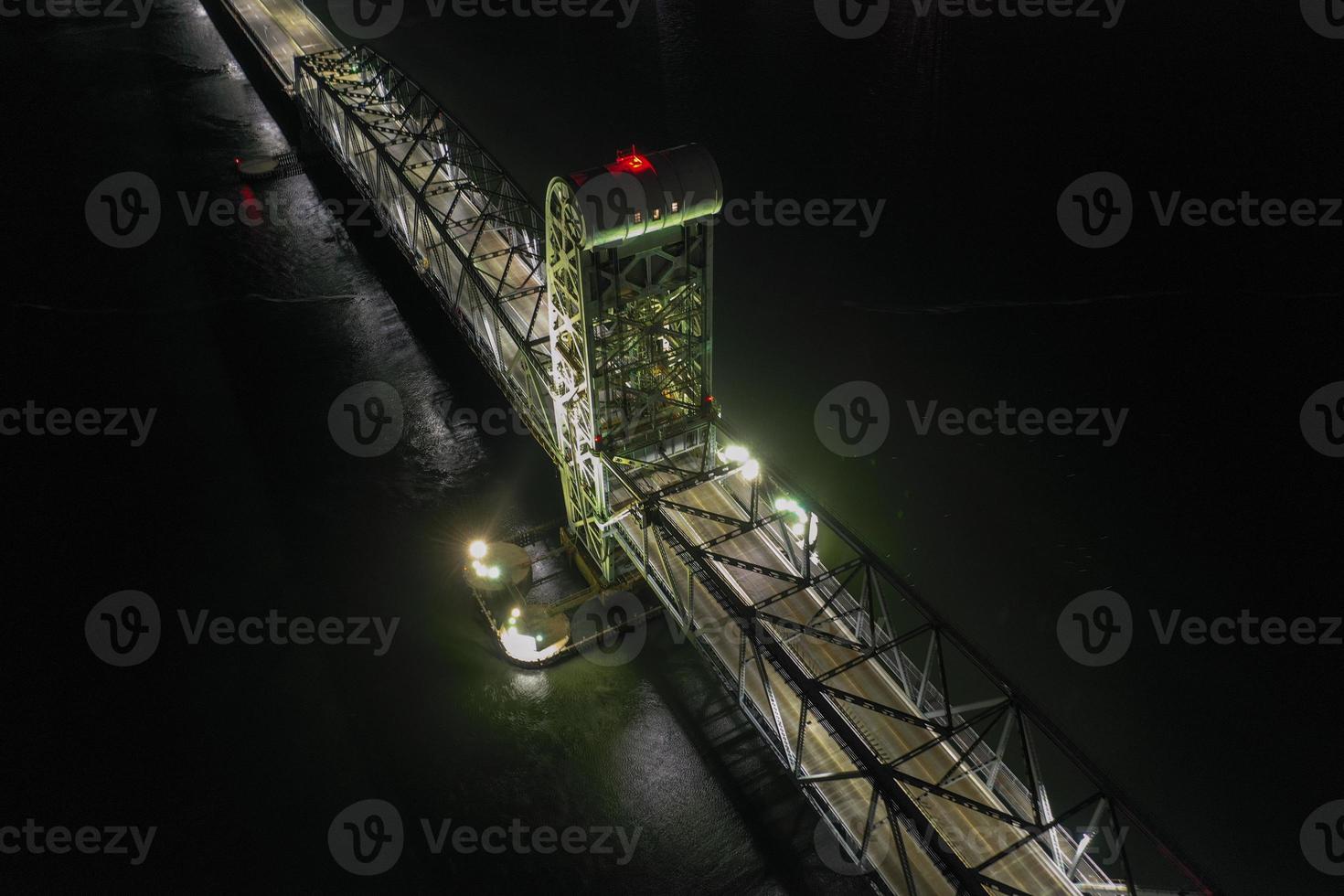 Marine Parkway-Gil Hodges Memorial Bridge as seen from Rockaway, Queens at night. Built and opened in 1937, it was the longest vertical-lift span in the world for automobiles. photo