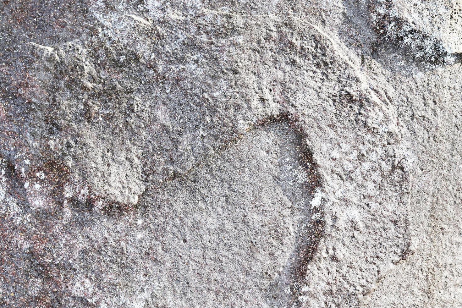 Detailed view on aged concrete walls with cracks and a lot of structure in high resolution photo