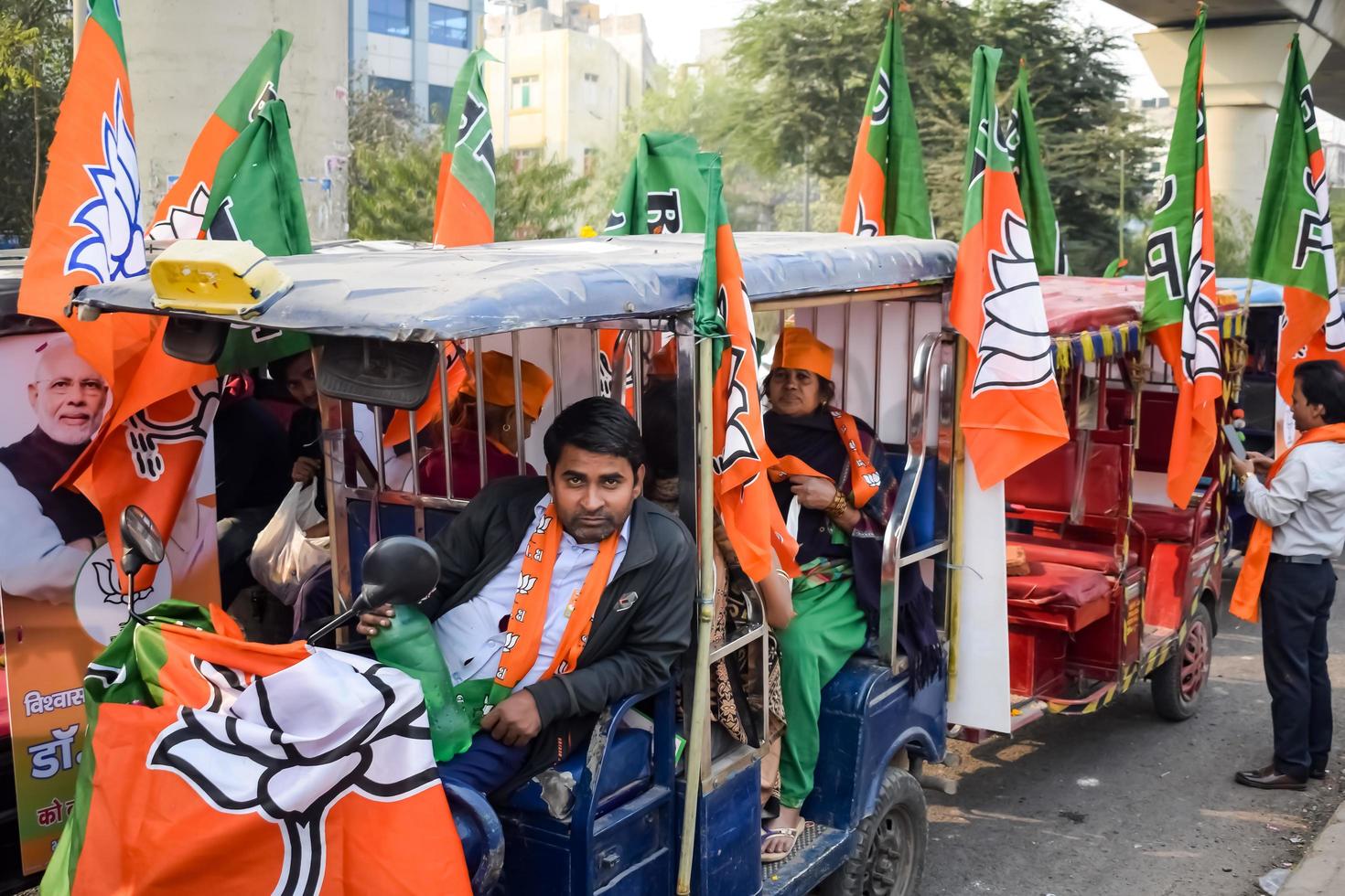 Delhi, India, December 02 2022  - Bharatiya Janata Party BJP supporter during mega road show in support of BJP candidate Pankaj Luthara to file nomination papers ahead of MCD local body Elections 2022 photo